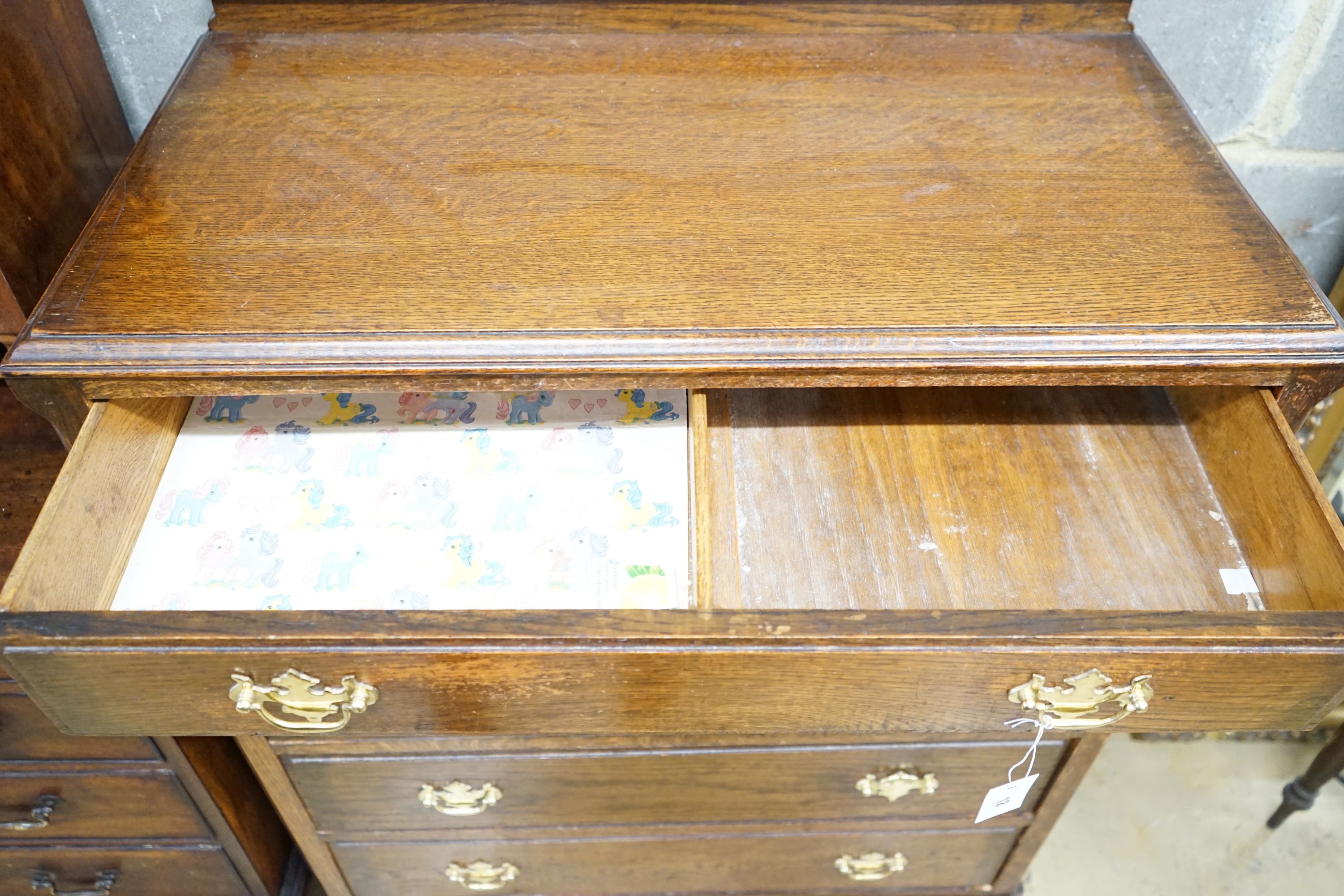 A 1920s oak chest of five drawers, width 89cm, depth 46cm, height 110cm
